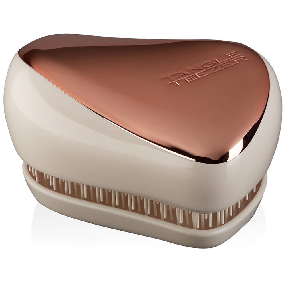 Tangle Teezer Compact Styler Hairbrush with a protective cover for travel-friendly detangling.