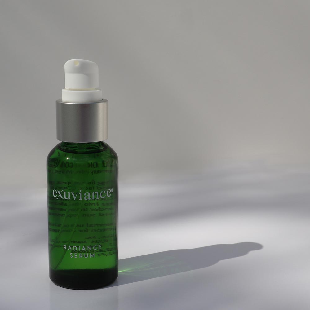 30 ml Exuviance Radiance Serum with powerful antioxidants and AHA/PHA formula for smoother, brighter skin.