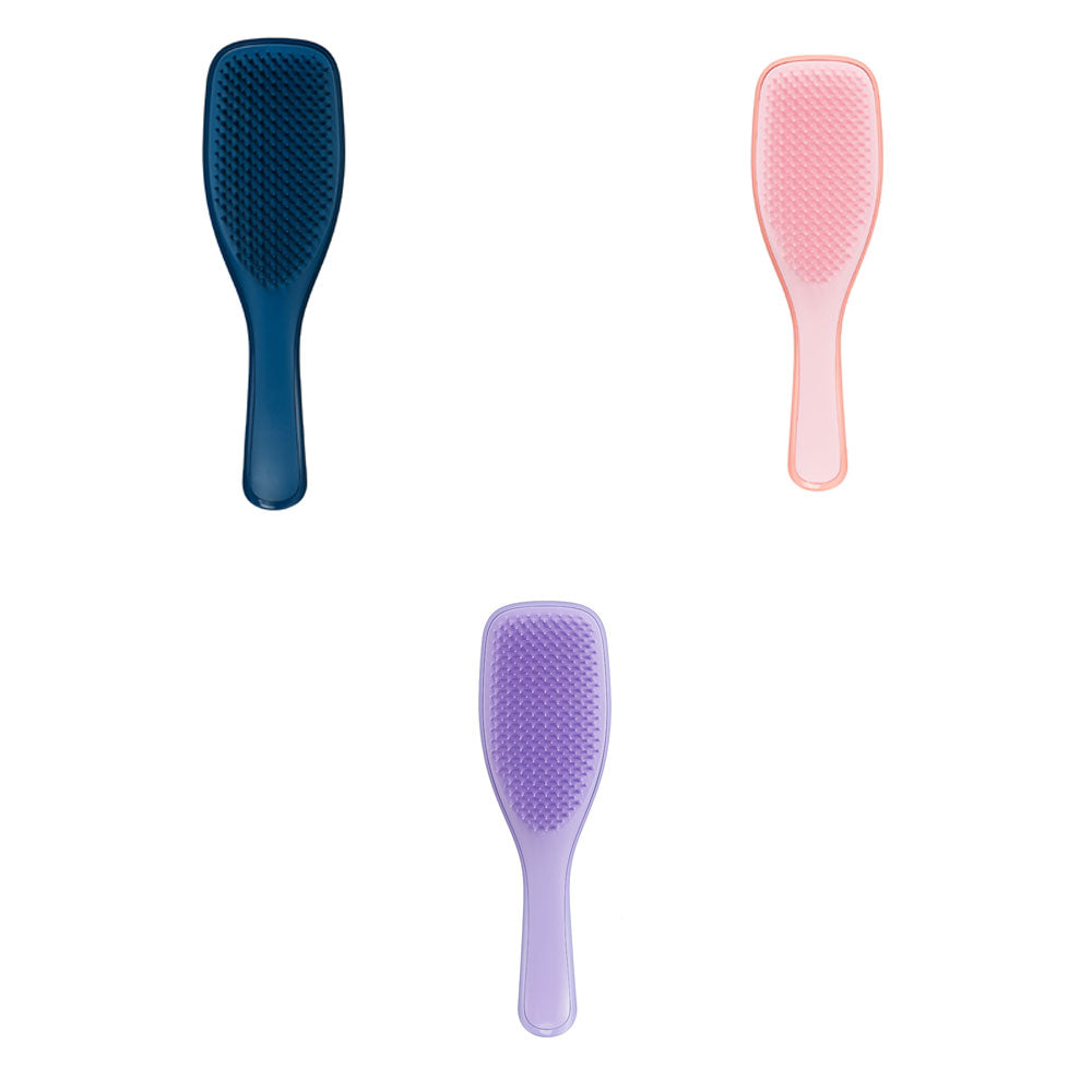 A Tangle Teezer Naturally Curly Hairbrush in multiple colors, designed for 3C-4C hair types, enhances curl pattern, reduces frizz, and detangles easily