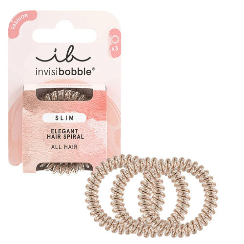 SLIM – Bronze and Beads: Slim bronze Invisibobble® hair ring accented with bead-like details, packaged sustainably.