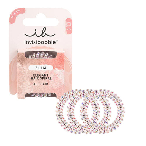 SLIM – Vanity Fairy: Slim shimmering Invisibobble® hair ring with a glittery finish, presented in eco-friendly packaging.